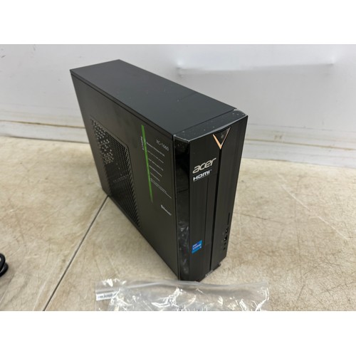 5277 - An InWin Tower PC case and Acer tower case with motherboard