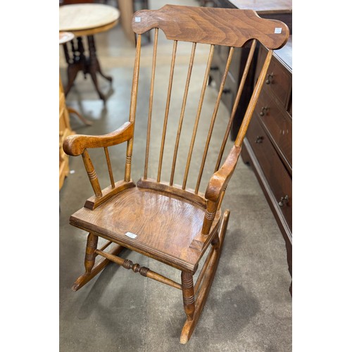 322 - An early 20th Century beech rocking chair