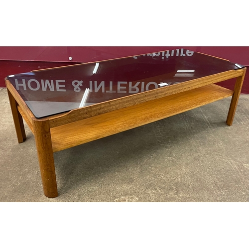 3 - A Myer teak and smoked glass topped rectangular coffee table