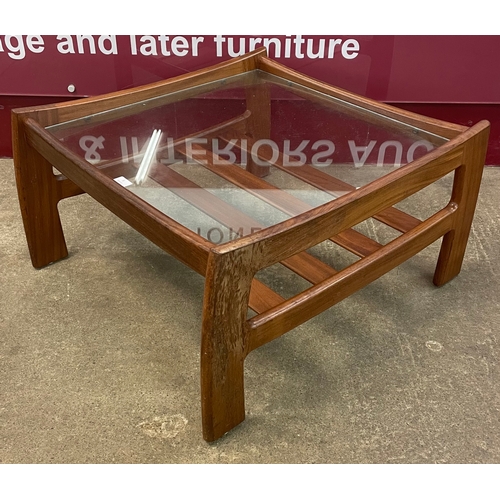 5 - A G-Plan Katrina teak and smoked glass topped square coffee table