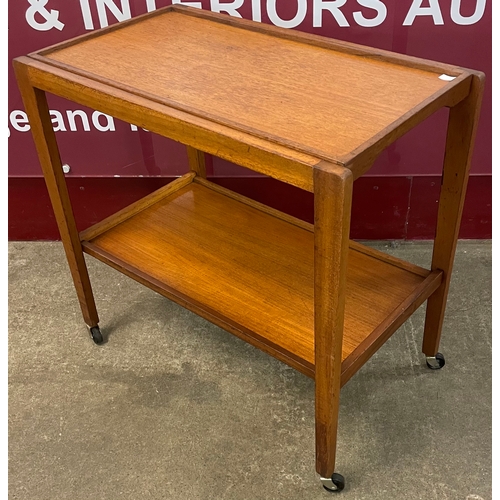 17 - A teak two tier cocktail trolley