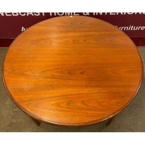 21 - A G-Plan Fresco teak circular extending dining table