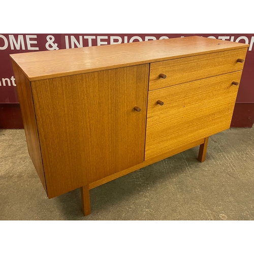 11 - A teak record cabinet