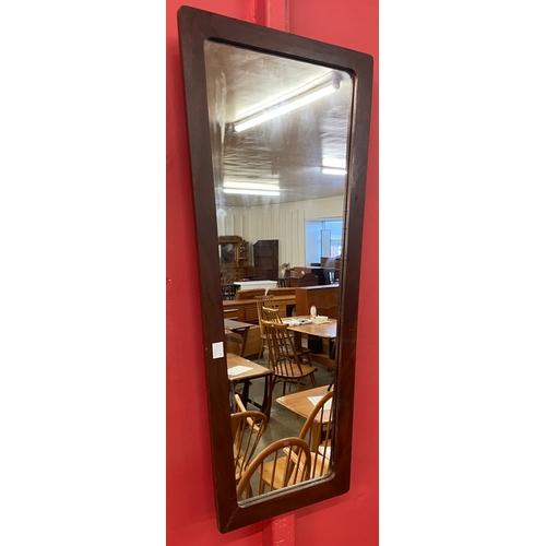 27 - A teak framed mirror