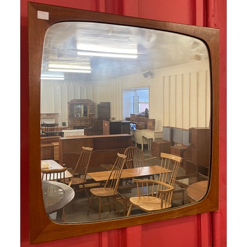 30 - A teak framed mirror