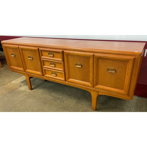 32 - A teak sideboard