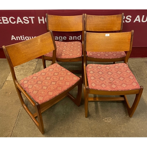 38 - A set of four Portwood Furniture teak dining chairs