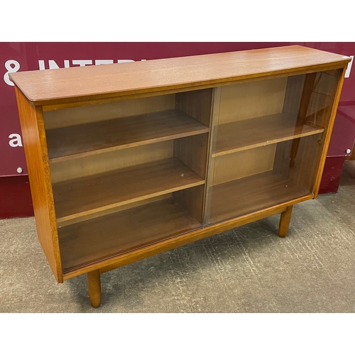 41 - A teak two door bookcase