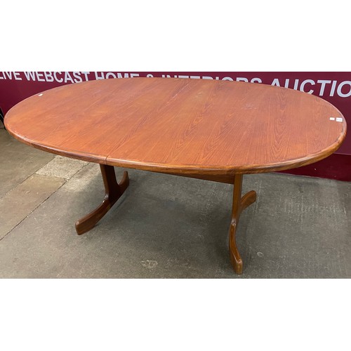 49 - A G-Plan Fresco teak oval extending dining table