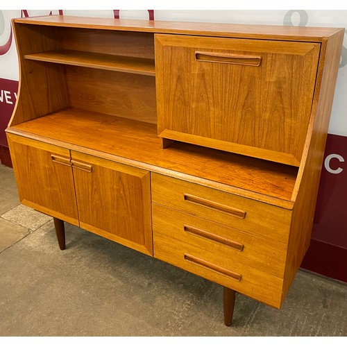 53 - A teak highboard