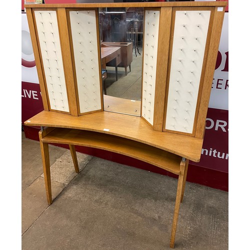 57 - A teak dressing table