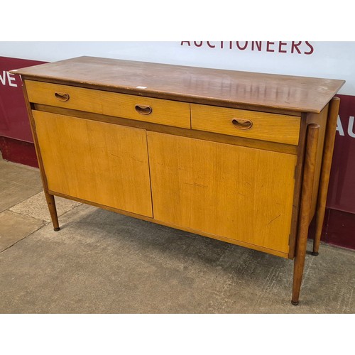 64 - A teak sideboard