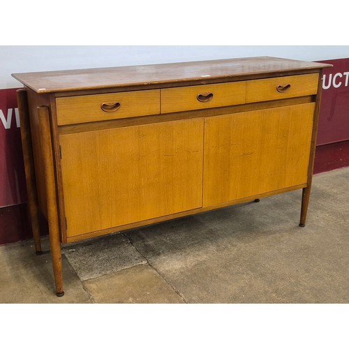 64 - A teak sideboard