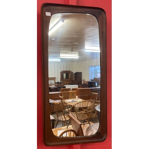 29 - A teak framed mirror