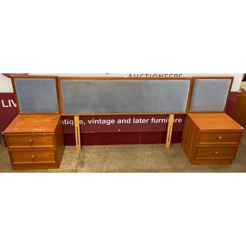 71 - A G-Plan teak headboard and a pair of bedside chests