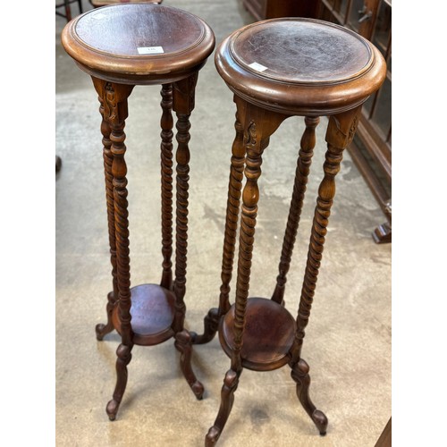 136 - A pair of early 20th Century mahogany barleytwist jardiniere stands