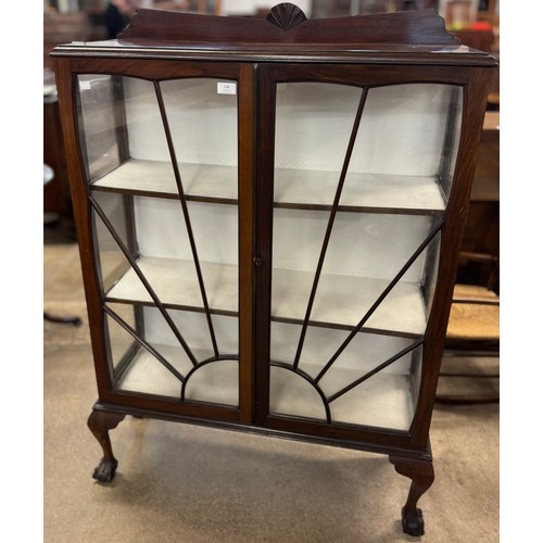 138 - An early 20th Century walnut display cabinet