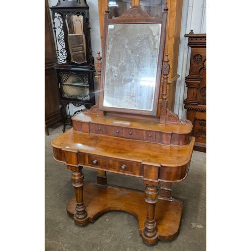 166 - A Victorian walnut Duchess dressing table