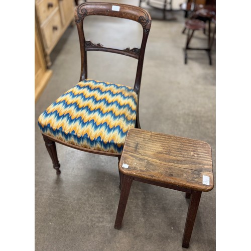 142 - A Regency carved rosewood dining chair and an oak stool