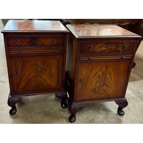 144 - A pair of Reprodux flame mahogany bedside cabinets