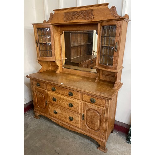 79 - An early 20th Century carved oak dresser