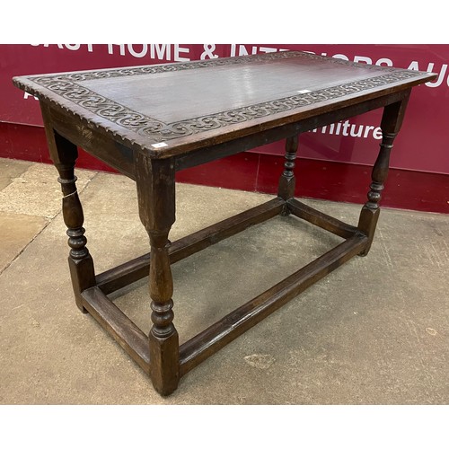 82 - A William III carved oak side table