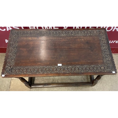 82 - A William III carved oak side table