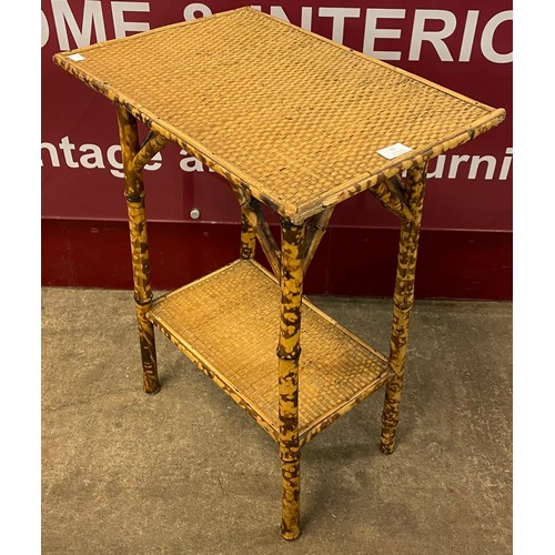 91 - A Victorian Aesthetic Movement bamboo two tier occasional table