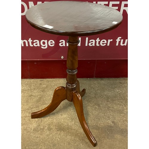 99 - A Victorian mahogany tripod wine table