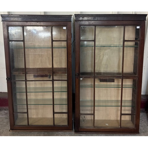 199 - A pair of George III style mahogany wall hanging display cabinets