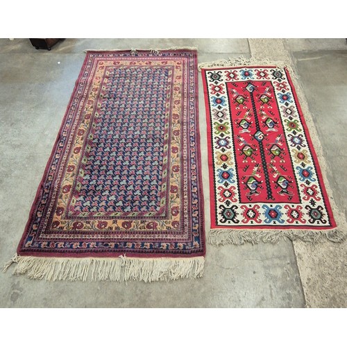 174 - Three assorted Eastern hand knotted rugs, 111 x 195cms, 81 x 155cms and 160 x 297cms