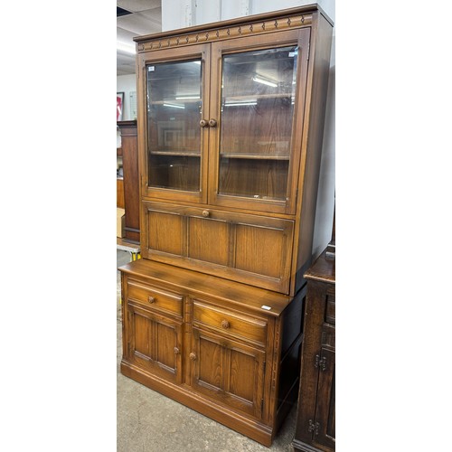 204 - An Ercol Golden Dawn ash bookcase/dresser