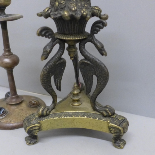 2097 - A Regency candlestick with phoenix detail and an early Victorian, (c.1845), candlestick in copper an... 