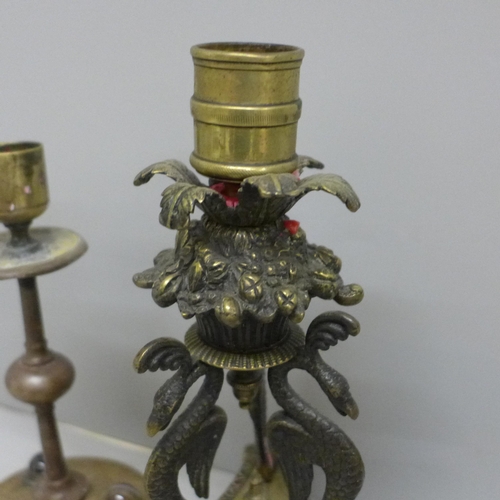2097 - A Regency candlestick with phoenix detail and an early Victorian, (c.1845), candlestick in copper an... 