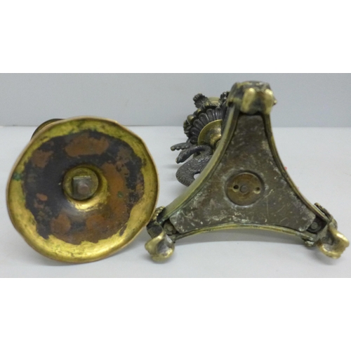 2097 - A Regency candlestick with phoenix detail and an early Victorian, (c.1845), candlestick in copper an... 