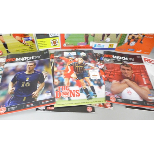 2180 - A collection of Scottish League football programmes including an Aberdeen coaster