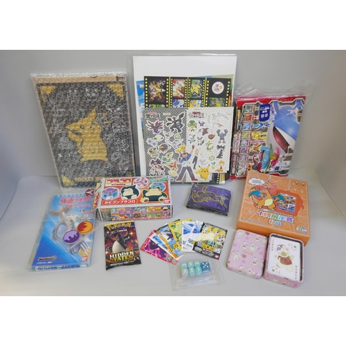 2242 - Pokémon stickers, vintage, including McDonalds, a Pocket Monsters Jumbo card, a Chinese Charizard se... 
