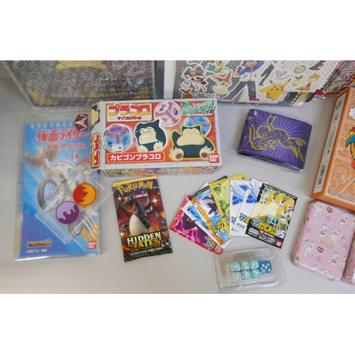 2242 - Pokémon stickers, vintage, including McDonalds, a Pocket Monsters Jumbo card, a Chinese Charizard se... 