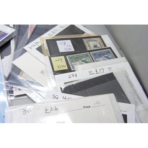 2278 - Stamps; a box of stamps on cards and in packets, many items in the catalogue range of £10-£30