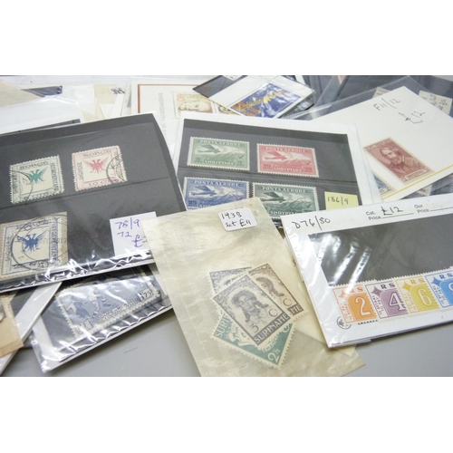 2278 - Stamps; a box of stamps on cards and in packets, many items in the catalogue range of £10-£30