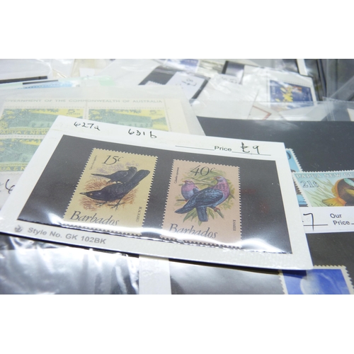 2278 - Stamps; a box of stamps on cards and in packets, many items in the catalogue range of £10-£30