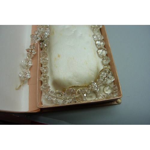 2283 - A collection of bead necklaces including moonstone, faux pearls and a three strand cultured pearl ne... 