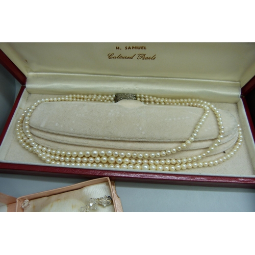 2283 - A collection of bead necklaces including moonstone, faux pearls and a three strand cultured pearl ne... 