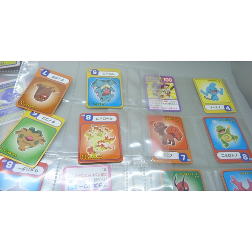 2291 - A collection of Pokémon playing cards (vintage), Pokémon board game sets and eighteen Japanese Pokém... 