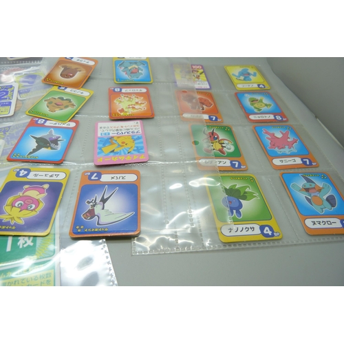 2291 - A collection of Pokémon playing cards (vintage), Pokémon board game sets and eighteen Japanese Pokém... 