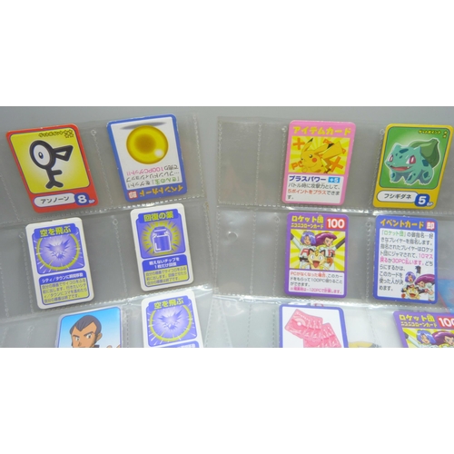 2292 - A collection of Pokémon playing cards, vintage, Pokémon board game cards, Pokémon stickers, Japanese... 