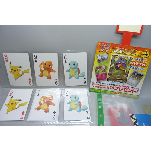 2292 - A collection of Pokémon playing cards, vintage, Pokémon board game cards, Pokémon stickers, Japanese... 