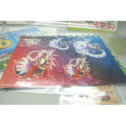 2292 - A collection of Pokémon playing cards, vintage, Pokémon board game cards, Pokémon stickers, Japanese... 