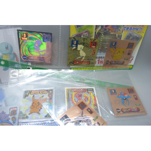 2292 - A collection of Pokémon playing cards, vintage, Pokémon board game cards, Pokémon stickers, Japanese... 