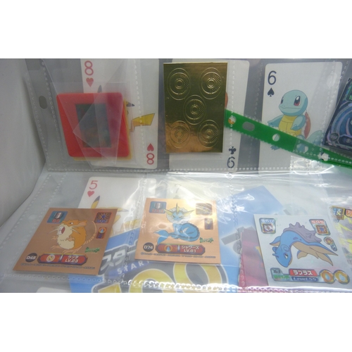 2292 - A collection of Pokémon playing cards, vintage, Pokémon board game cards, Pokémon stickers, Japanese... 